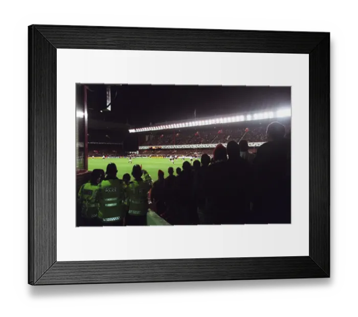 Framed Print : The Police watch the match, photographed from the South West corner