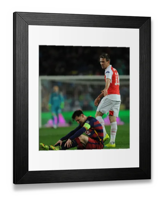 Framed Print : Nacho Monreal Fouls Lionel Messi: Intense Barcelona vs. Arsenal UEFA Champions League Clash