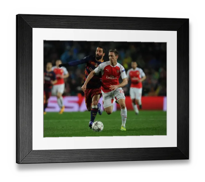 Framed Print : Monreal vs Turan: A Football Battle at Camp Nou - Arsenal vs Barcelona, UEFA Champions League 2016