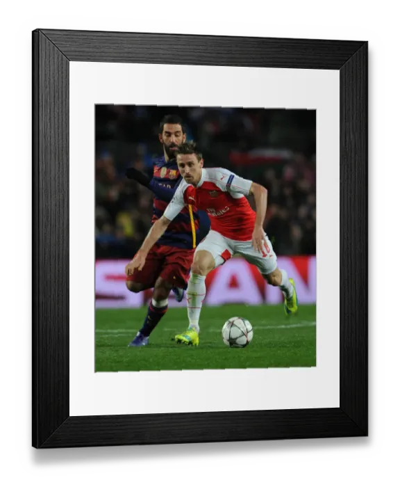 Framed Print : Monreal vs Turan: The Intense Clash at Camp Nou - Arsenal FC vs FC Barcelona, UEFA Champions League 2016