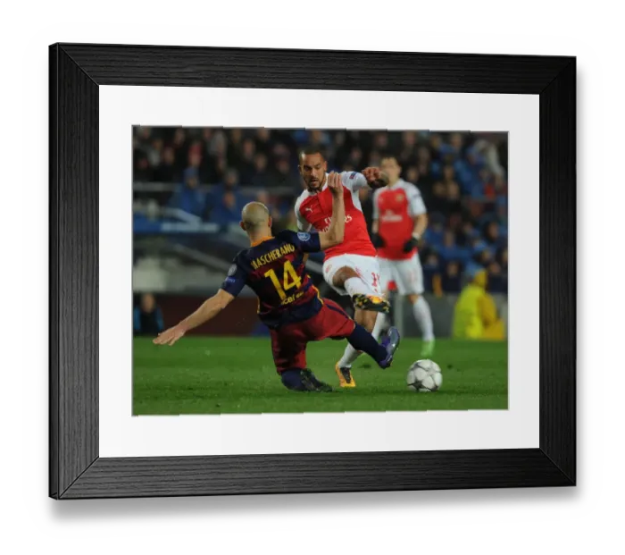 Framed Print : Theo Walcott vs Javier Mascherano: A Battle of Wits in the Barcelona vs Arsenal UEFA Champions League Clash Framed Print : Theo Walcott vs Javier Mascherano: A Battle of Wits in the Barcelona vs Arsenal UEFA Champions League Clash