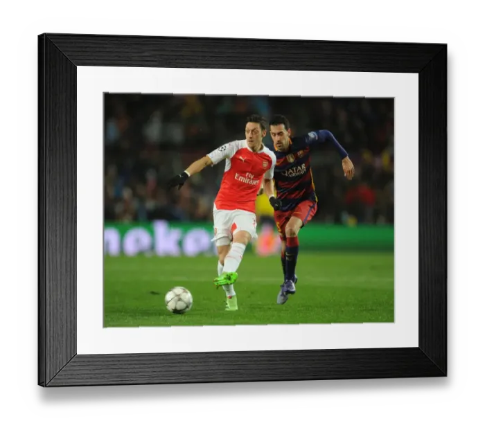Framed Print : Clash of the Midfield Maestros: Mesut Ozil vs Sergio Busquets, Arsenal vs FC Barcelona, UEFA Champions League 2015-16 Framed Print : Clash of the Midfield Maestros: Mesut Ozil vs Sergio Busquets, Arsenal vs FC Barcelona, UEFA Champions League 2015-16