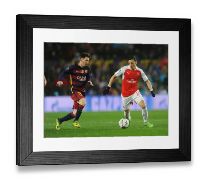 Framed Print : Mesut Ozil vs. Lionel Messi: A Champions League Battle