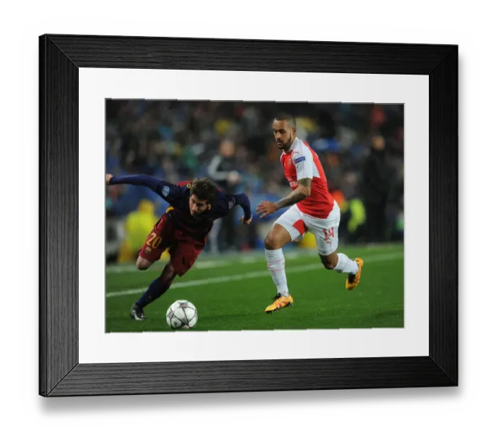 Framed Print : Theo Walcott vs. Sergi Roberto: A Battle in the UEFA Champions League