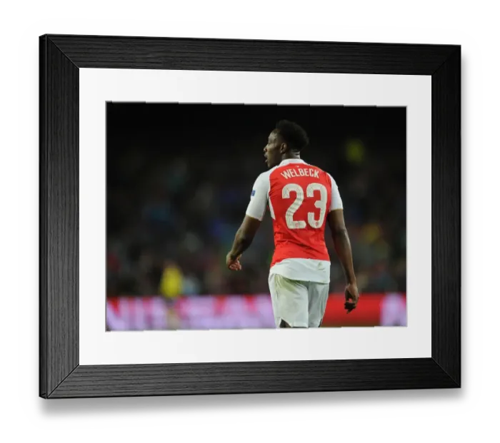 Framed Print : Danny Welbeck vs. Barcelona: Arsenal's Brave Battle in the UEFA Champions League (2015-16)