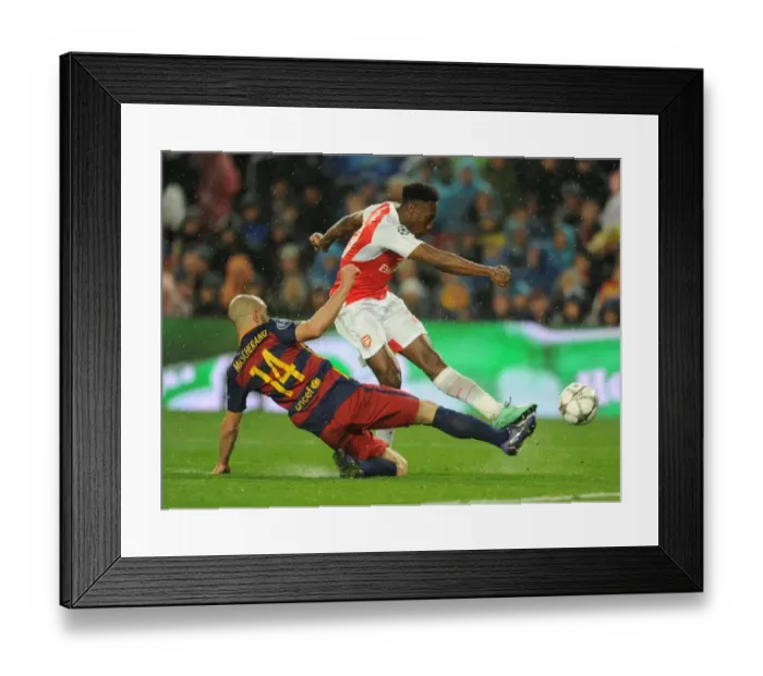 Framed Print : Welbeck vs. Mascherano: A Tense Shooting Showdown in the Barcelona vs. Arsenal UEFA Champions League Clash