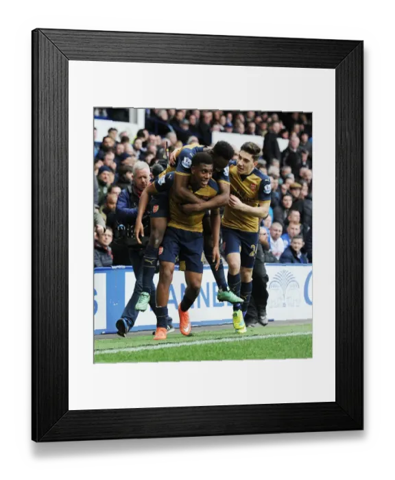 Framed Print : Arsenal Triumph: Iwobi, Welbeck, and Bellerin Celebrate Goals Against Everton (2015-16)