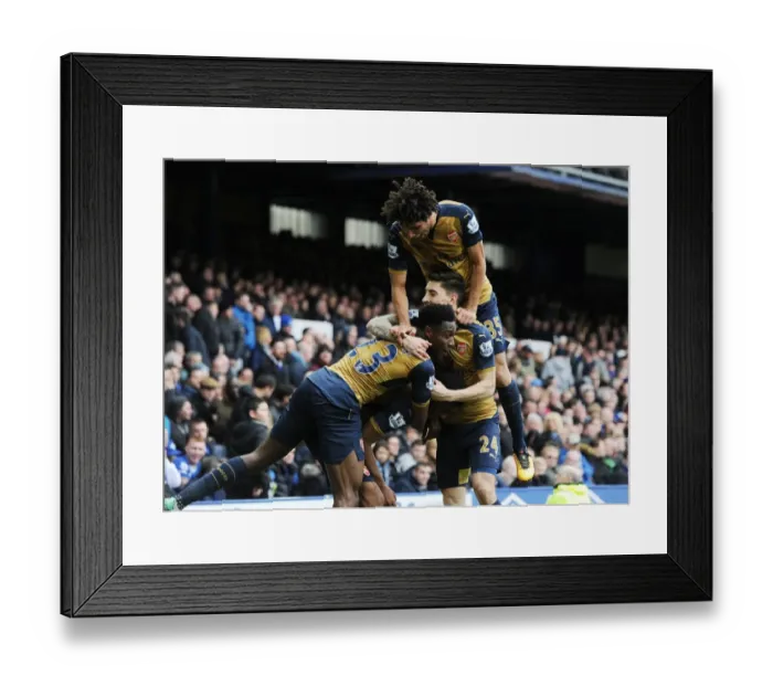 Framed Print : Arsenal Celebrate Double Strike: Iwobi, Welbeck, Bellerin, and Elneny Rejoice after Scoring against Everton (2015-16) Framed Print : Arsenal Celebrate Double Strike: Iwobi, Welbeck, Bellerin, and Elneny Rejoice after Scoring against Everton (2015-16)