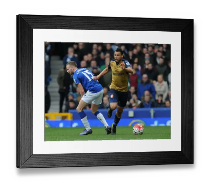 Framed Print : Coquelin's Triumph: Surging Past Cleverley in the Heat of Everton vs Arsenal Rivalry, Premier League 2015-16 Framed Print : Coquelin's Triumph: Surging Past Cleverley in the Heat of Everton vs Arsenal Rivalry, Premier League 2015-16