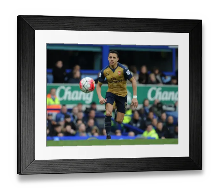 Framed Print : Arsenal's Alexis Sanchez Goes Head-to-Head with Everton in Intense Premier League Showdown (2015-16) Framed Print : Arsenal's Alexis Sanchez Goes Head-to-Head with Everton in Intense Premier League Showdown (2015-16)