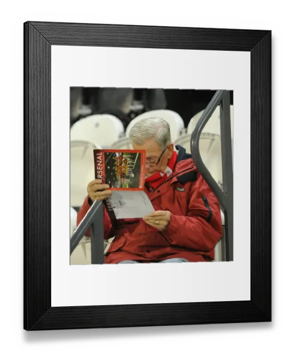 Framed Print : Arsenal Ladies Triumph: Fans Celebrate 3-1 WSL Victory over Reading FC Women at Meadow Park