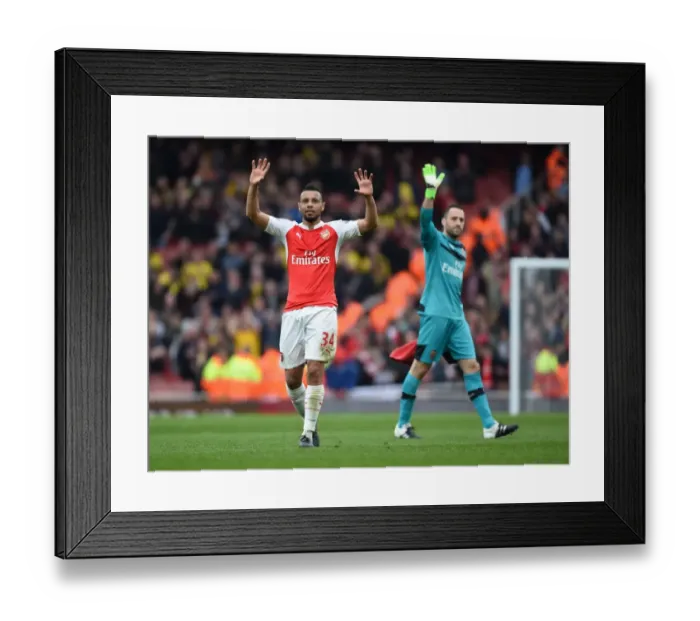 Framed Print : Arsenal's Francis Coquelin Celebrates with Fans after Securing Victory over Watford Framed Print : Arsenal's Francis Coquelin Celebrates with Fans after Securing Victory over Watford