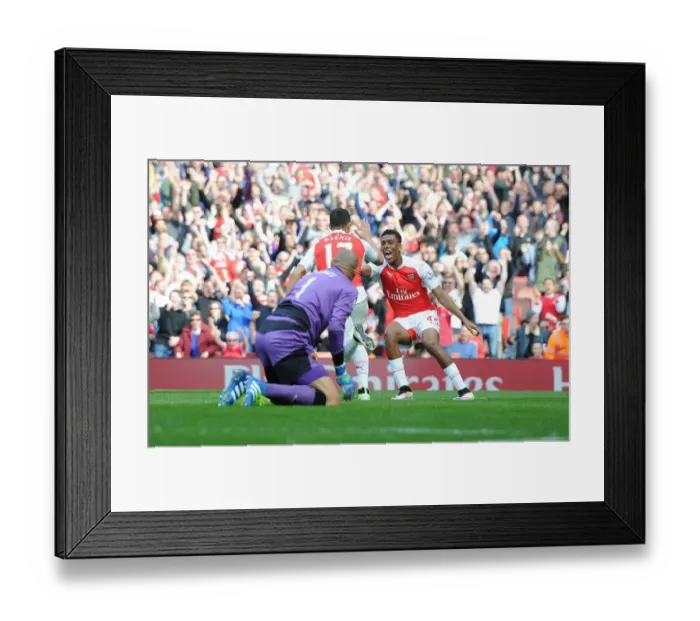 Framed Print : Alexis Sanchez and Alex Iwobi: Celebrating Their First Arsenal Goals Against Watford (2015-16)