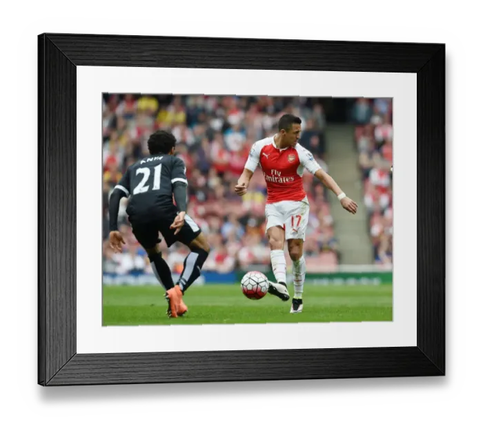 Framed Print : Sanchez vs. Anya: Intense Battle in Arsenal vs. Watford Premier League Clash