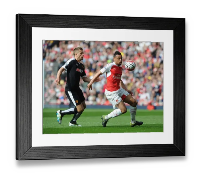Framed Print : Coquelin vs. Abdi: A Premier League Clash at Emirates Stadium Framed Print : Coquelin vs. Abdi: A Premier League Clash at Emirates Stadium