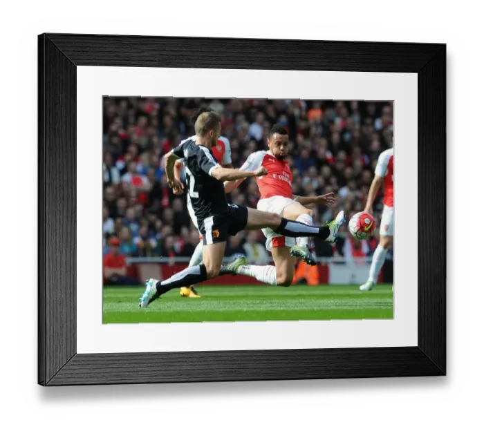 Framed Print : Coquelin vs. Abdi: A Premier League Battle at Emirates Stadium