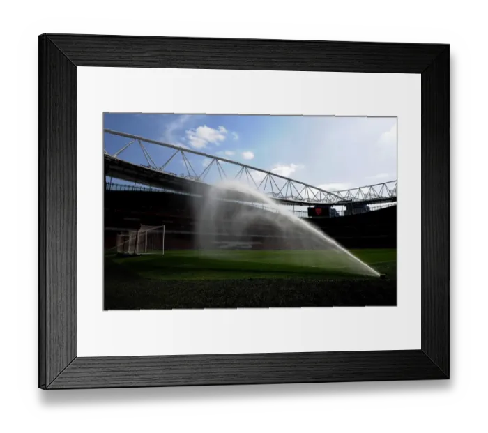Framed Print : Arsenal's Dominant Performance: 4-0 Victory Over Watford in a Rain-Soaked Emirates
