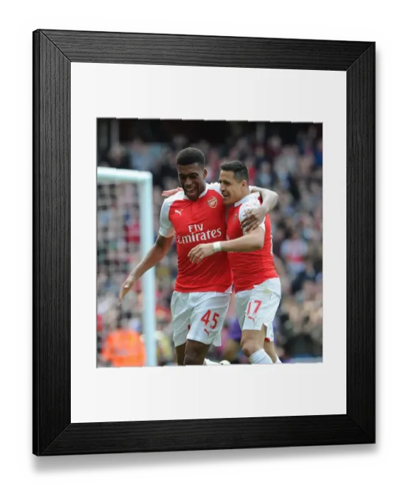 Framed Print : Sanchez and Iwobi's Unforgettable Goal Celebration: Arsenal's Glory Moment vs. Watford (2016)
