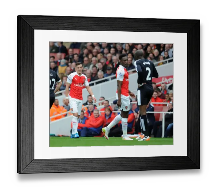 Framed Print : Mesut Ozil in Deep Chat with Allan Nyom during Arsenal vs. Watford, Premier League 2015-16
