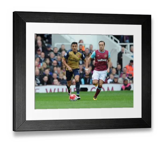 Framed Print : Alexis Sanchez Outsmarts Mark Noble: Premier League Showdown Between Arsenal and West Ham (April 2016) Framed Print : Alexis Sanchez Outsmarts Mark Noble: Premier League Showdown Between Arsenal and West Ham (April 2016)