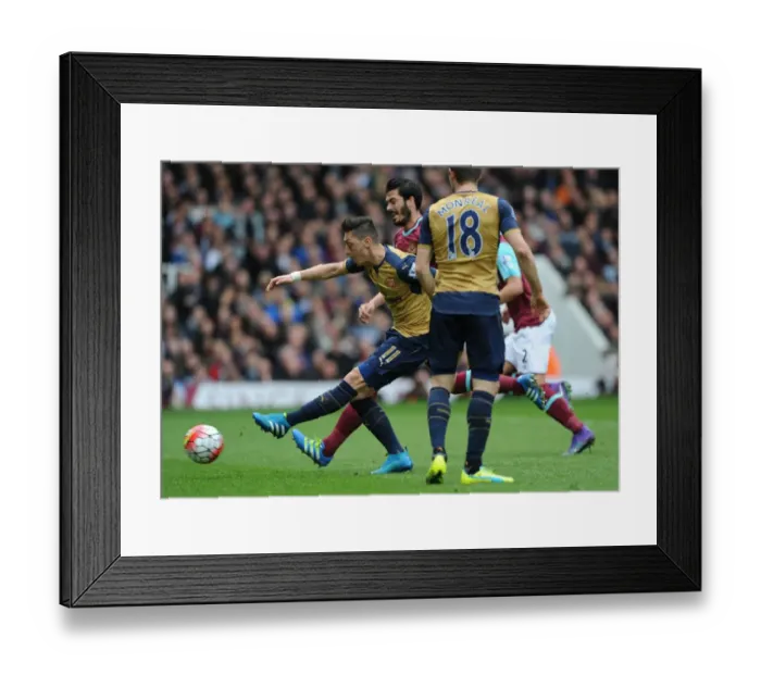 Framed Print : Mesut Ozil Scores: Arsenal Triumphs Over West Ham United in Premier League 2015-16 Framed Print : Mesut Ozil Scores: Arsenal Triumphs Over West Ham United in Premier League 2015-16