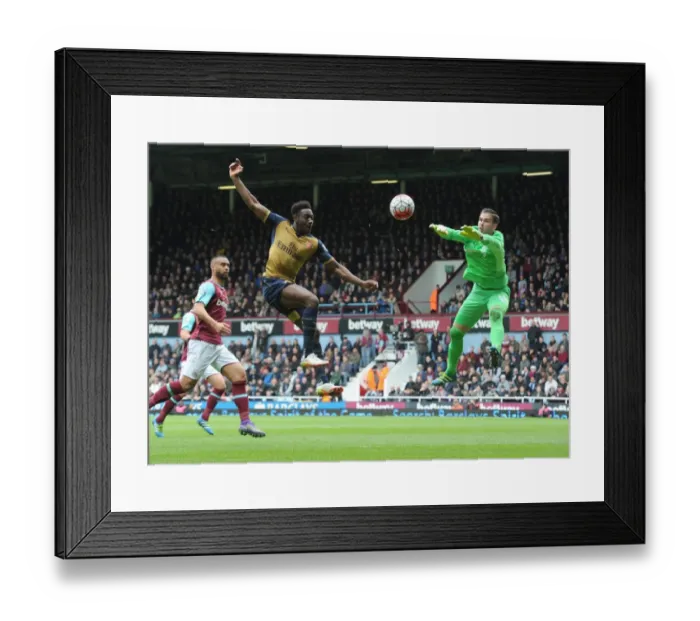 Framed Print : Intense Showdown: Welbeck vs. Adrian - Arsenal's Attempt to Score Past West Ham's Goalkeeper Framed Print : Intense Showdown: Welbeck vs. Adrian - Arsenal's Attempt to Score Past West Ham's Goalkeeper