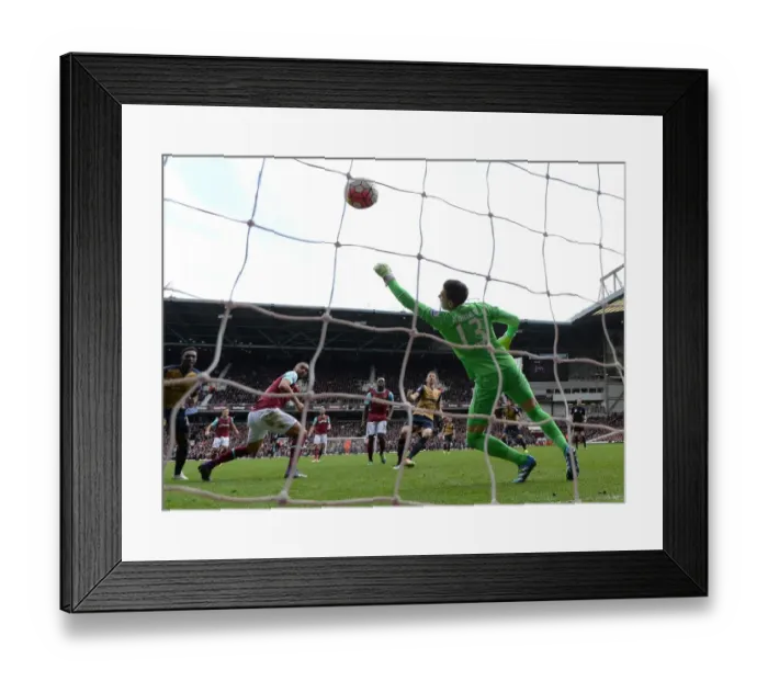 Framed Print : Koscielny's Strike: Arsenal's Triumph over West Ham in the Premier League (April 2016)