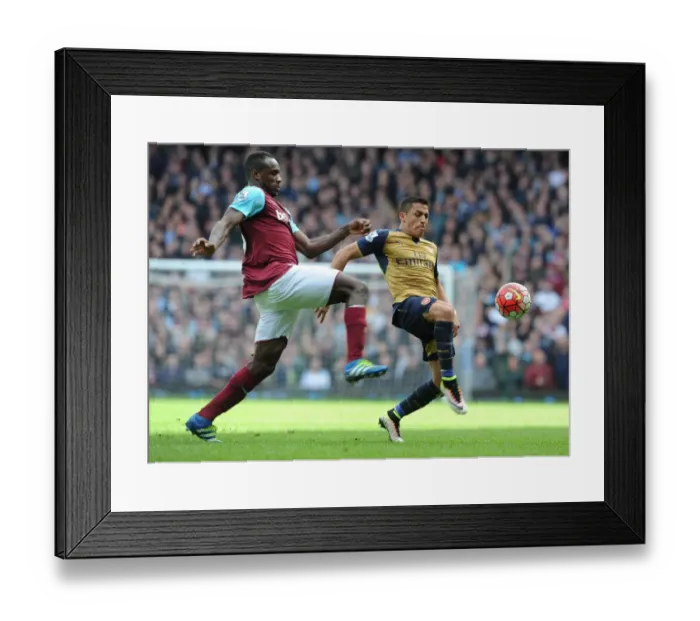 Framed Print : Clash of Stars: Sanchez vs. Antonio in Premier League Showdown