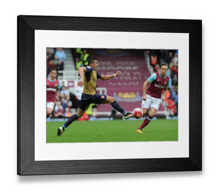 Framed Print : Clash of Leaders: Alexis Sanchez vs. Mark Noble in Premier League Showdown Framed Print : Clash of Leaders: Alexis Sanchez vs. Mark Noble in Premier League Showdown