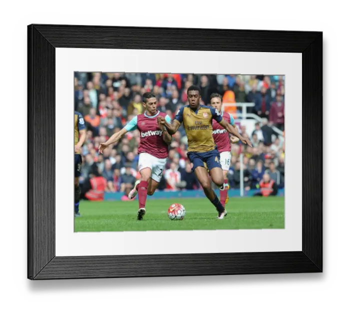 Framed Print : Clash of the Midfield Maestros: Iwobi vs. Lanzini in Premier League Showdown Framed Print : Clash of the Midfield Maestros: Iwobi vs. Lanzini in Premier League Showdown
