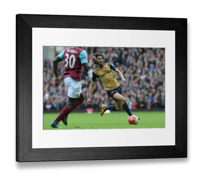 Framed Print : Mohamed Elneny (Arsenal). West Ham United 3: 3 Arsenal