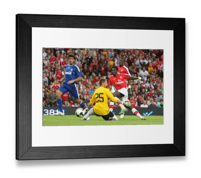 Framed Print : Adebayor vs. Dudek: Arsenal's Edge over Real Madrid in the Emirates Cup Clash, 2008 Framed Print : Adebayor vs. Dudek: Arsenal's Edge over Real Madrid in the Emirates Cup Clash, 2008