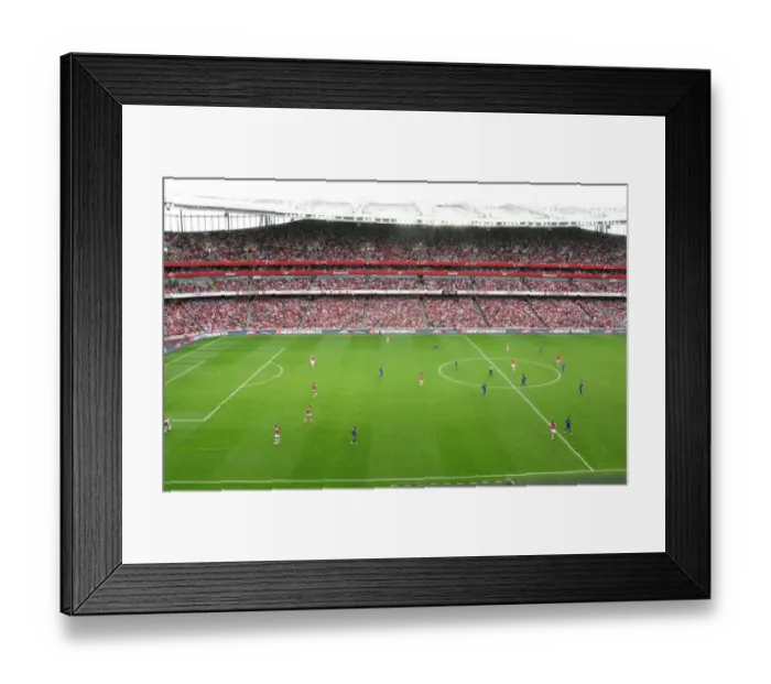 Framed Print : Arsenal's Triumph over Real Madrid at Emirates Stadium: A Victory Illuminated by Citroen Ads