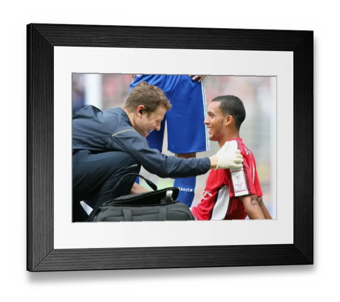 Framed Print : Theo Walcott's Victory Moment with Arsenal Physio Colin Lewin after Arsenal's 1:0 Win over Real Madrid, Emirates Cup, 2008 Framed Print : Theo Walcott's Victory Moment with Arsenal Physio Colin Lewin after Arsenal's 1:0 Win over Real Madrid, Emirates Cup, 2008