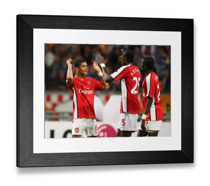 Framed Print : Emmanuel Adebayor celebrates scoring the 3rd Arsenal Framed Print : Emmanuel Adebayor celebrates scoring the 3rd Arsenal