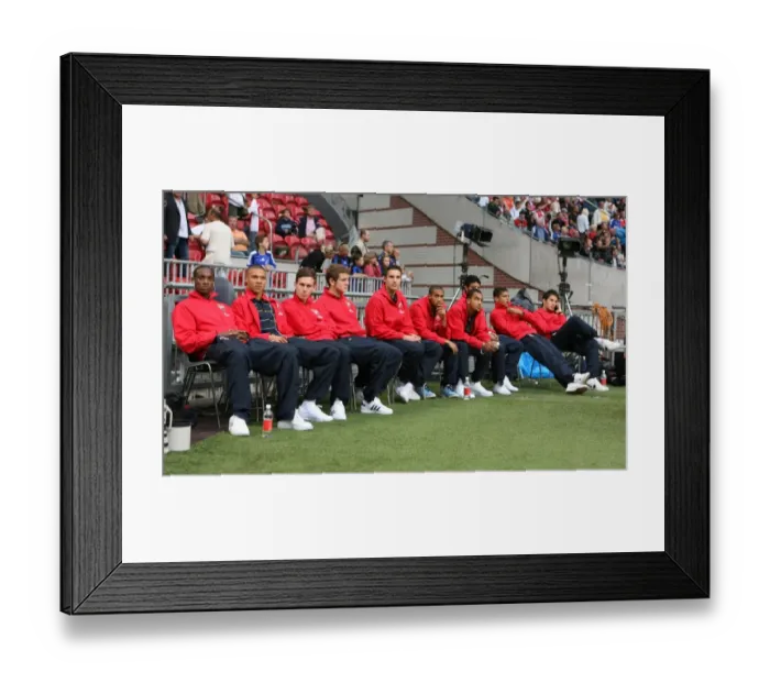 Framed Print : Arsenal players wathc the match between Seville and Inter Milan