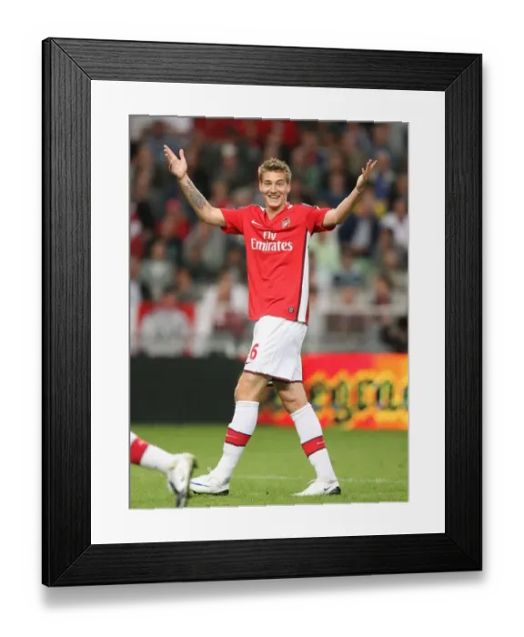 Framed Print : Bendtner's Brilliant Strike: Arsenal's Comeback in Amsterdam (2-3)