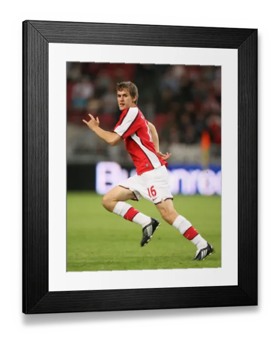 Framed Print : Arsenal's Aaron Ramsey Scores Game-Winning Goal Against Ajax at Amsterdam Arena, 2008 Framed Print : Arsenal's Aaron Ramsey Scores Game-Winning Goal Against Ajax at Amsterdam Arena, 2008