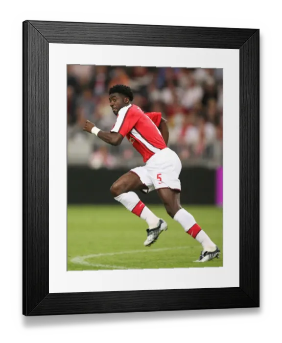 Framed Print : Arsenal's Triumph: Kolo Toure Leads the Gunners to a 3-2 Victory over Ajax in the Amsterdam Tournament, 2008