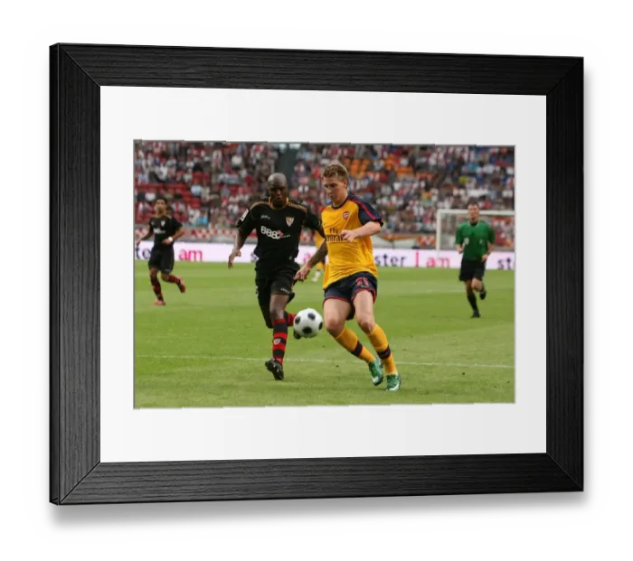 Framed Print : Nicklas Bendtner (Arsenal) Aquivaldo Romana (Seville)
