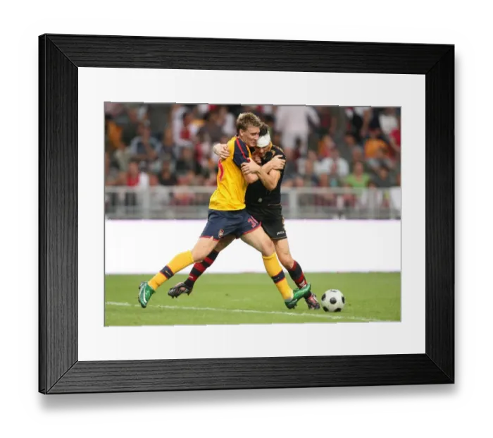 Framed Print : Arsenal Stars: Bendtner and Squillaci Face Off in Amsterdam Tournament Framed Print : Arsenal Stars: Bendtner and Squillaci Face Off in Amsterdam Tournament