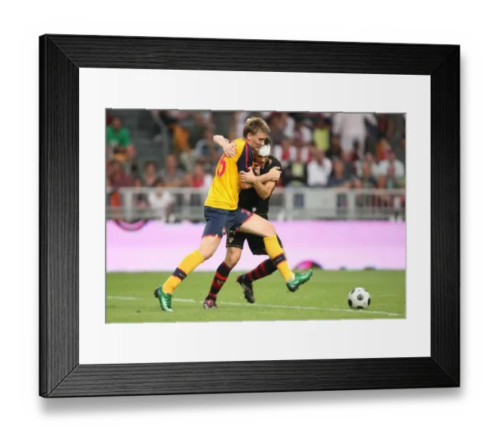 Framed Print : Arsenal Stars Clash: Bendtner vs. Squillaci at the 2008 Amsterdam Tournament Framed Print : Arsenal Stars Clash: Bendtner vs. Squillaci at the 2008 Amsterdam Tournament