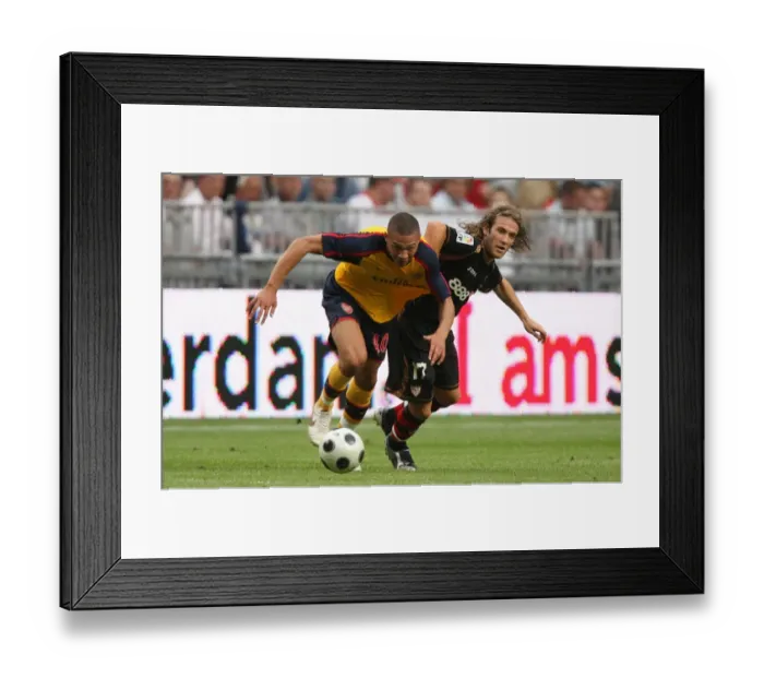 Framed Print : Kieran Gibbs (Arsenal) Diego Trinidad (Seville) Framed Print : Kieran Gibbs (Arsenal) Diego Trinidad (Seville)