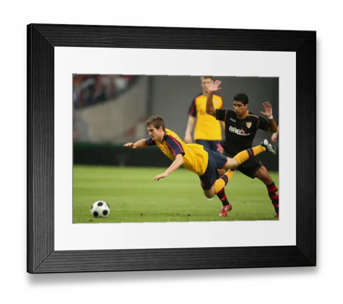 Framed Print : Aaron Ramsey (Arsenal) Renato (Seville) Framed Print : Aaron Ramsey (Arsenal) Renato (Seville)