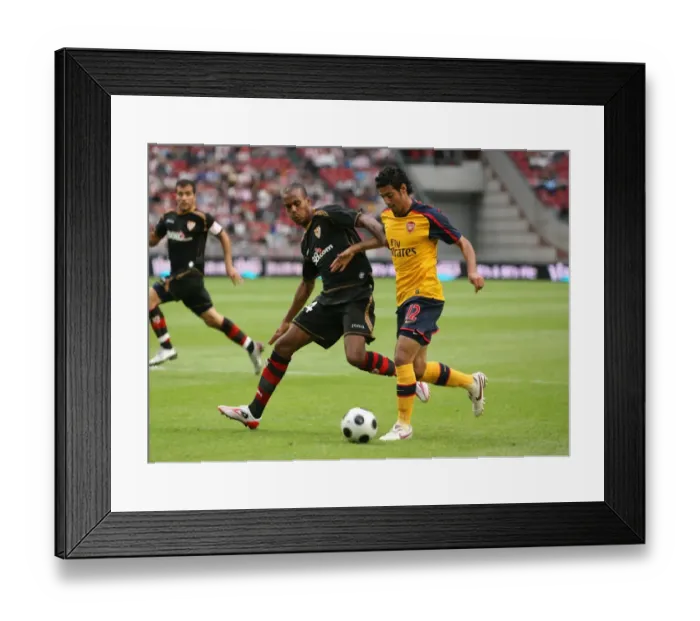 Framed Print : Vela's Stunning Goal: Beating Konko for Arsenal at the Amsterdam Tournament, 2008 Framed Print : Vela's Stunning Goal: Beating Konko for Arsenal at the Amsterdam Tournament, 2008