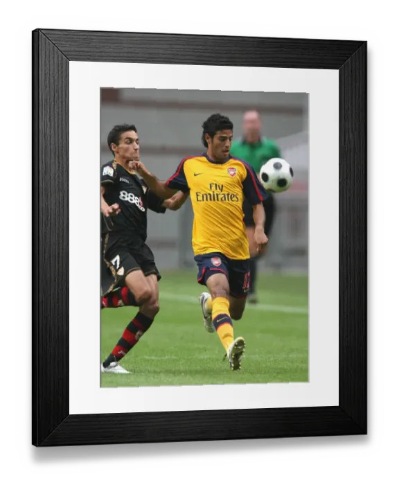 Framed Print : Carlos Vela (Arsenal) Jesus Gonzalez (Seville)