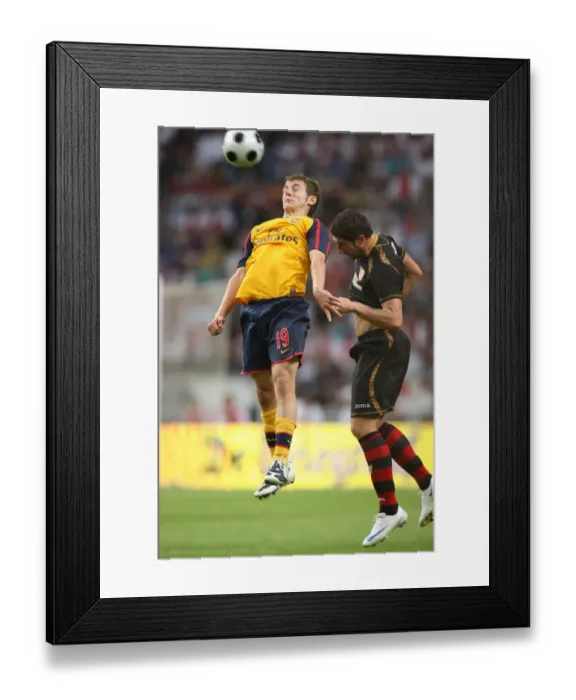 Framed Print : Jack Wilshere (Arsenal) Ivica Dragutinovic (Seville)