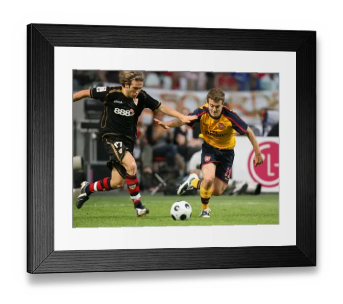 Framed Print : Jack Wilshere (Arsenal) Diego Trinidad (Seville)