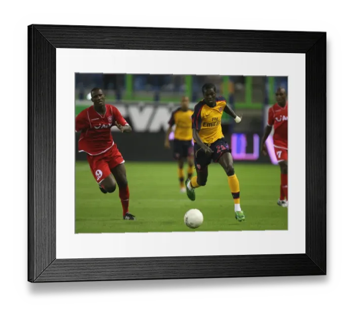 Framed Print : Adebayor's Double: Arsenal Crush FC Twente in Champions League Qualifier