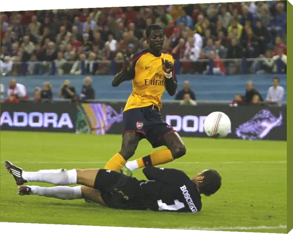 Emmanuel Adebayor shoots past FC Twente goalkeeper
